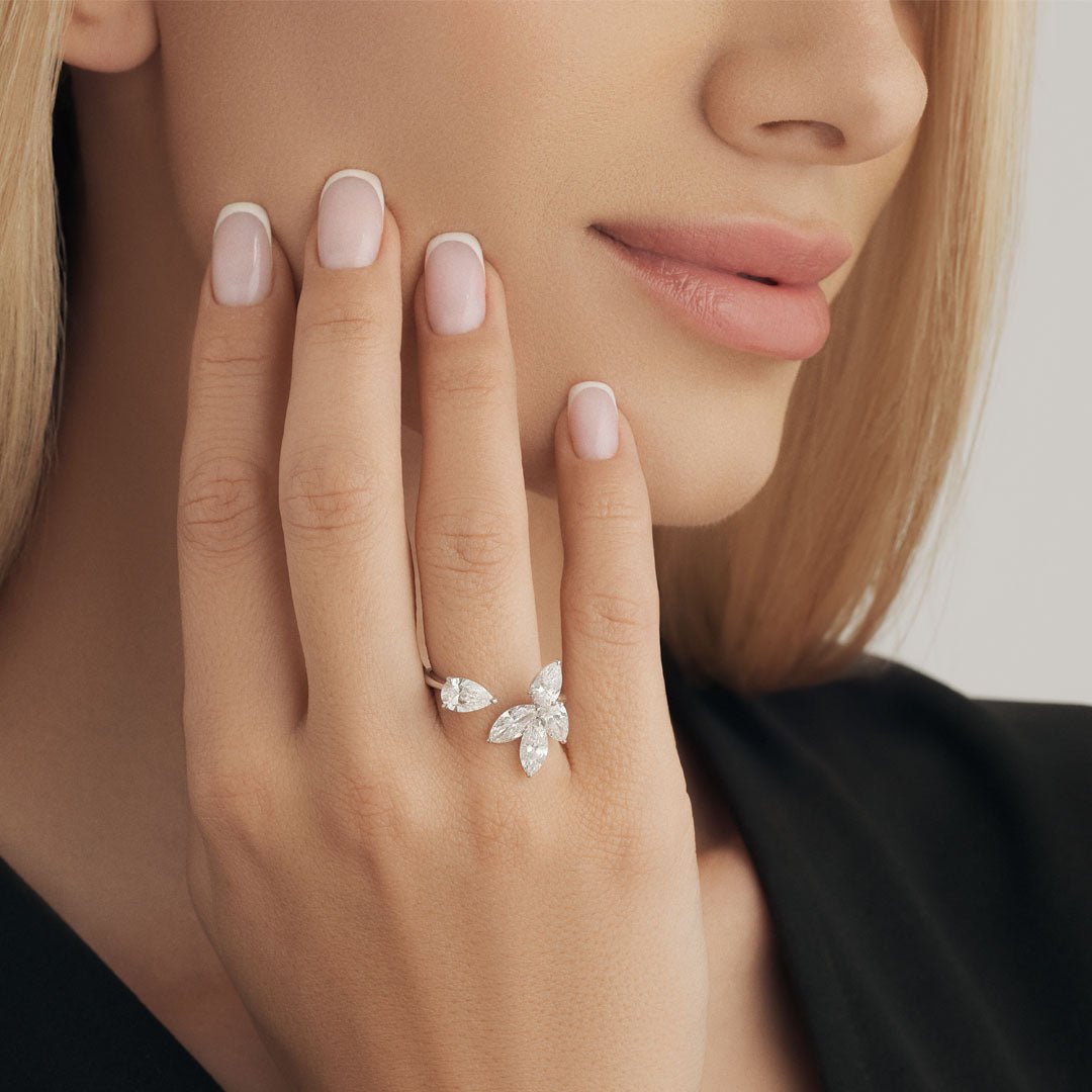 Adorn your hand with elegance: Diamond Ring featuring two marquise and three pear-shaped diamonds. - ETERNAL JEWEL