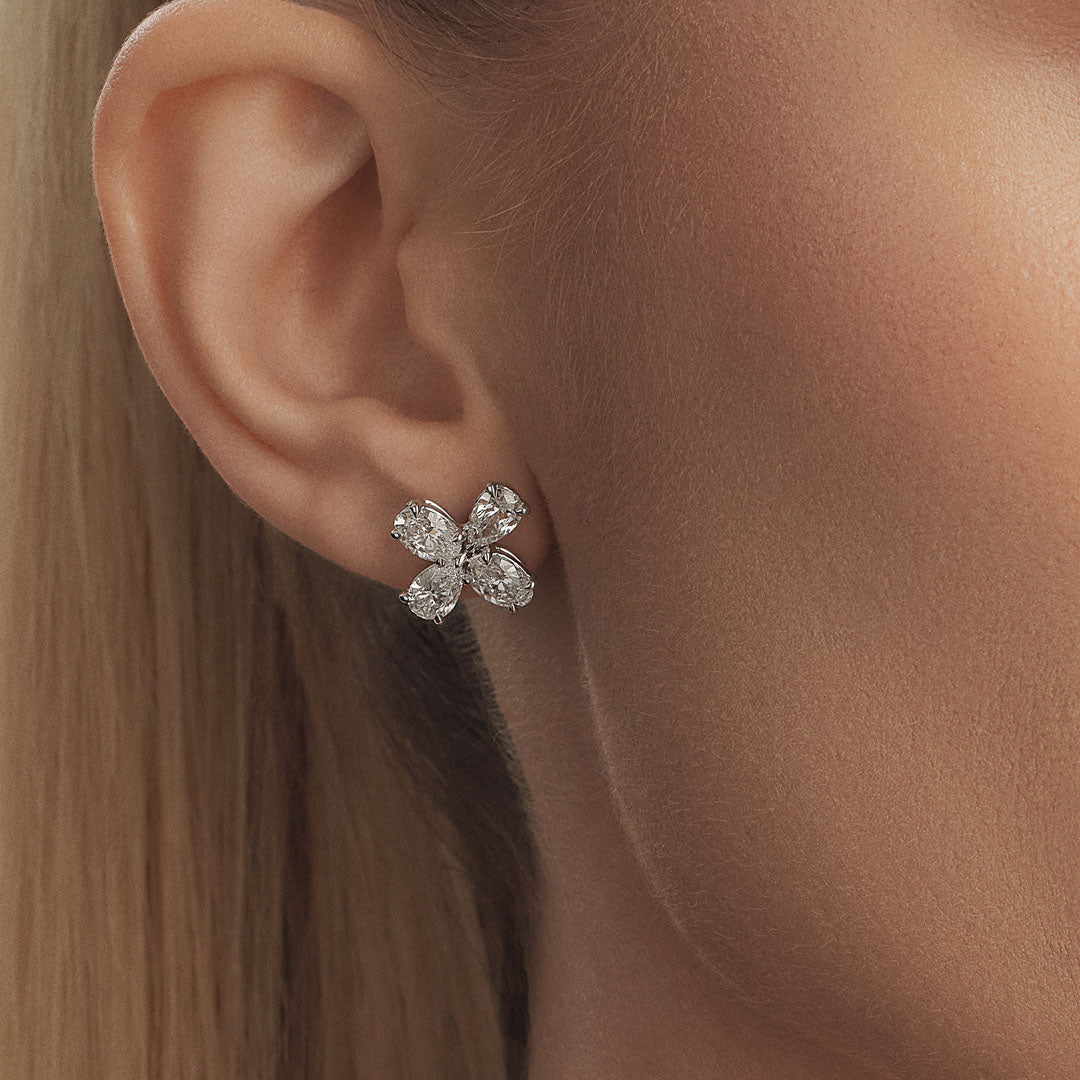 Blossom with our Diamond Flower Earrings, a radiant floral accent of sparkling elegance. - ETERNAL JEWEL