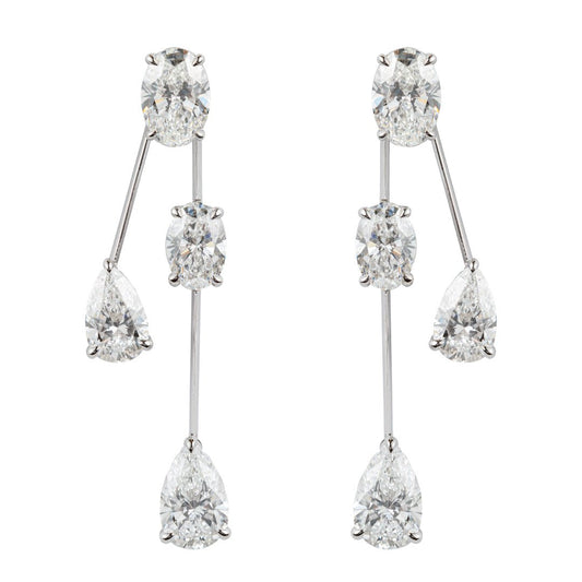 Chic elegance: Falling Diamond Earrings with round and pear-shaped gems. - ETERNAL JEWEL