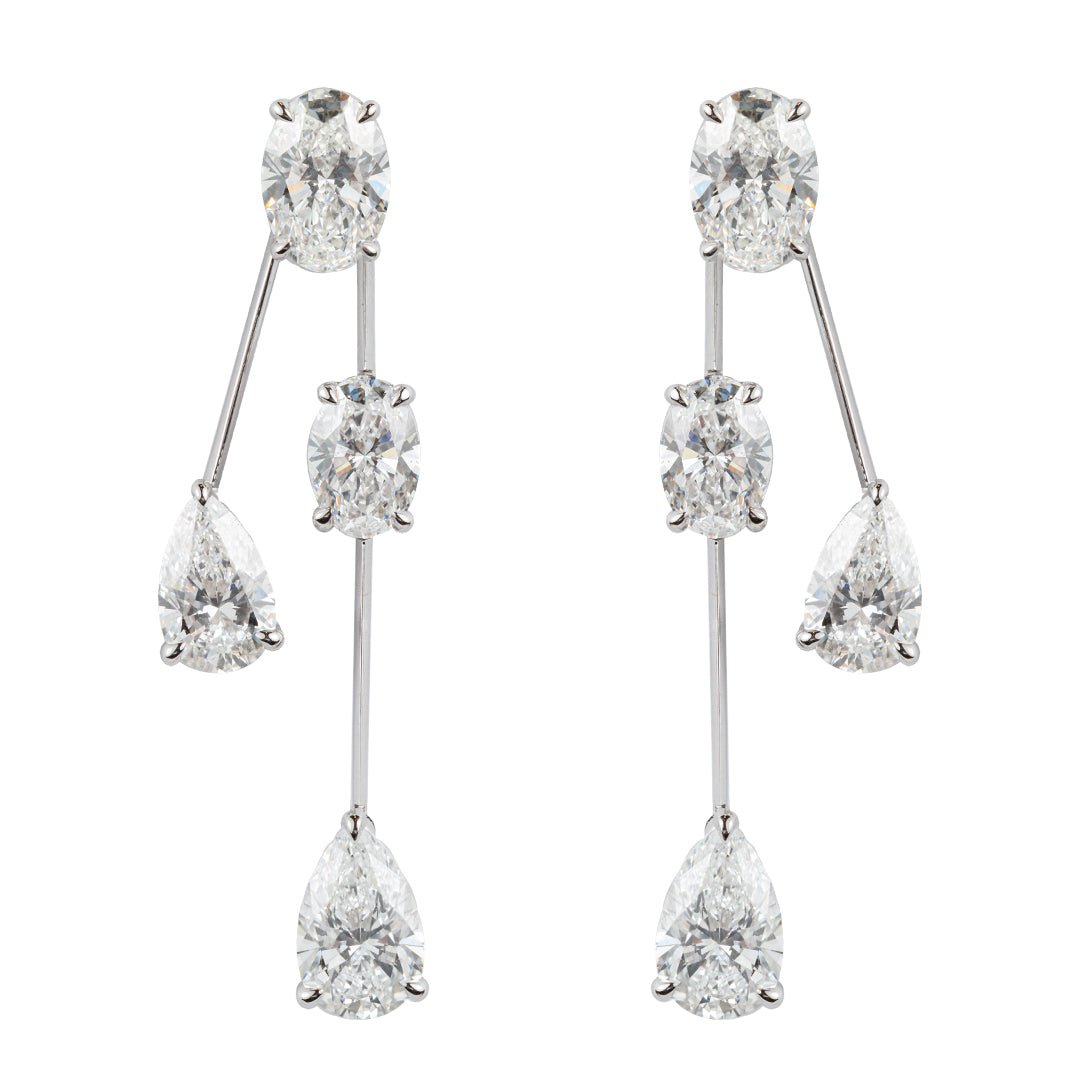 Chic elegance: Falling Diamond Earrings with round and pear-shaped gems. - ETERNAL JEWEL