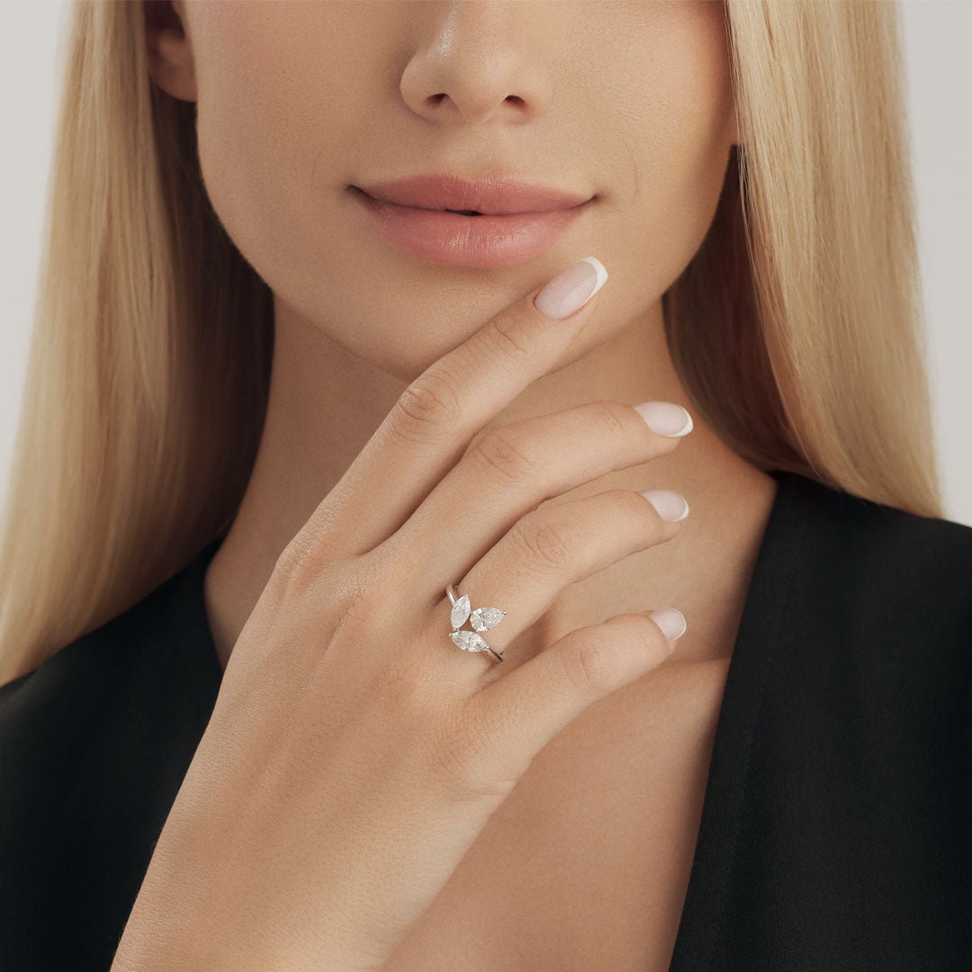 Dazzle with our Diamond Ring, showcasing three marquise and one pear-shaped diamond for elegant sophistication. - ETERNAL JEWEL