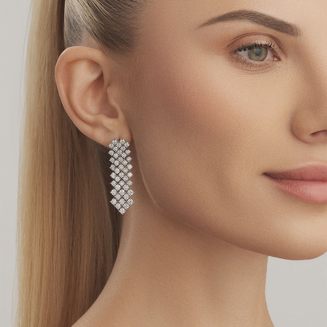 Enhance your allure with our exquisite diamond earring, a shimmering symbol of timeless elegance - ETERNAL JEWEL