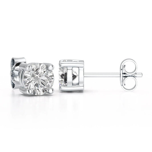 A solitary diamond stud earring offers a classic and elegant touch to any ensemble - ETERNA JEWELS