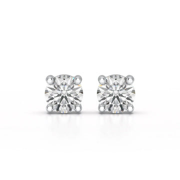 Single-stone diamond stud earrings offer timeless sophistication and versatility. - ETERNA JEWELS