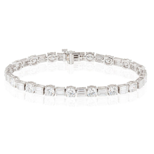 Tennis bracelet featuring alternating round-cut and emerald-cut stones exudes timeless elegance with a modern twist. - ETERNA JEWELS